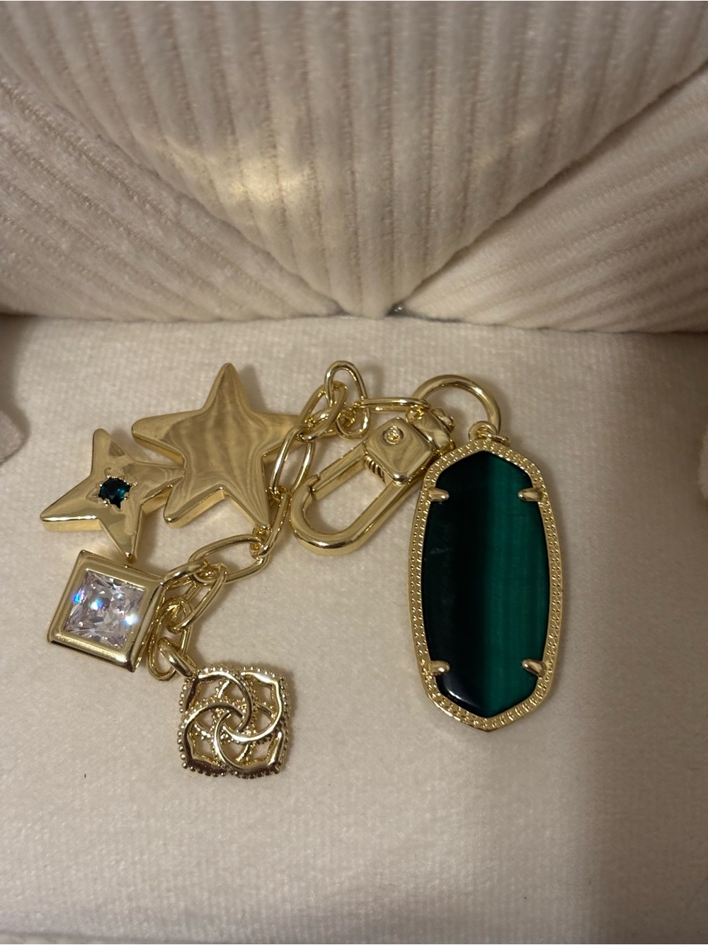 Kendra Scott Gold-Tone Keychain with Emerald Green Oval Pendant and Star Charms